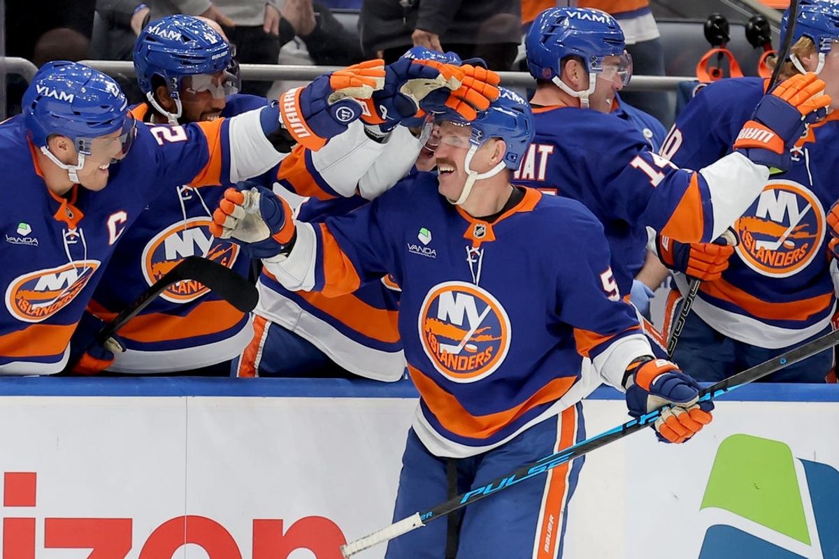 Dec 4, 2025; Elmont, New York, USA; New York Islanders center Casey Cizikas (53) celebrates his empty net goal against the Colorado Avalanche with teammates during the third period at UBS Arena. Mandatory Credit: Brad Penner-Imagn Images