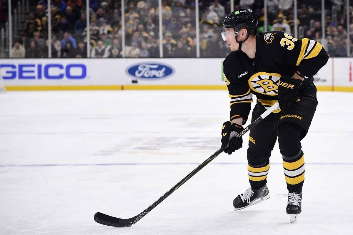 Dec 4, 2025; Boston, Massachusetts, USA; Boston Bruins center Morgan Geekie (39) controls the puck during the third period against the St. Louis Blues at TD Garden. Mandatory Credit: Bob DeChiara-Imagn Images