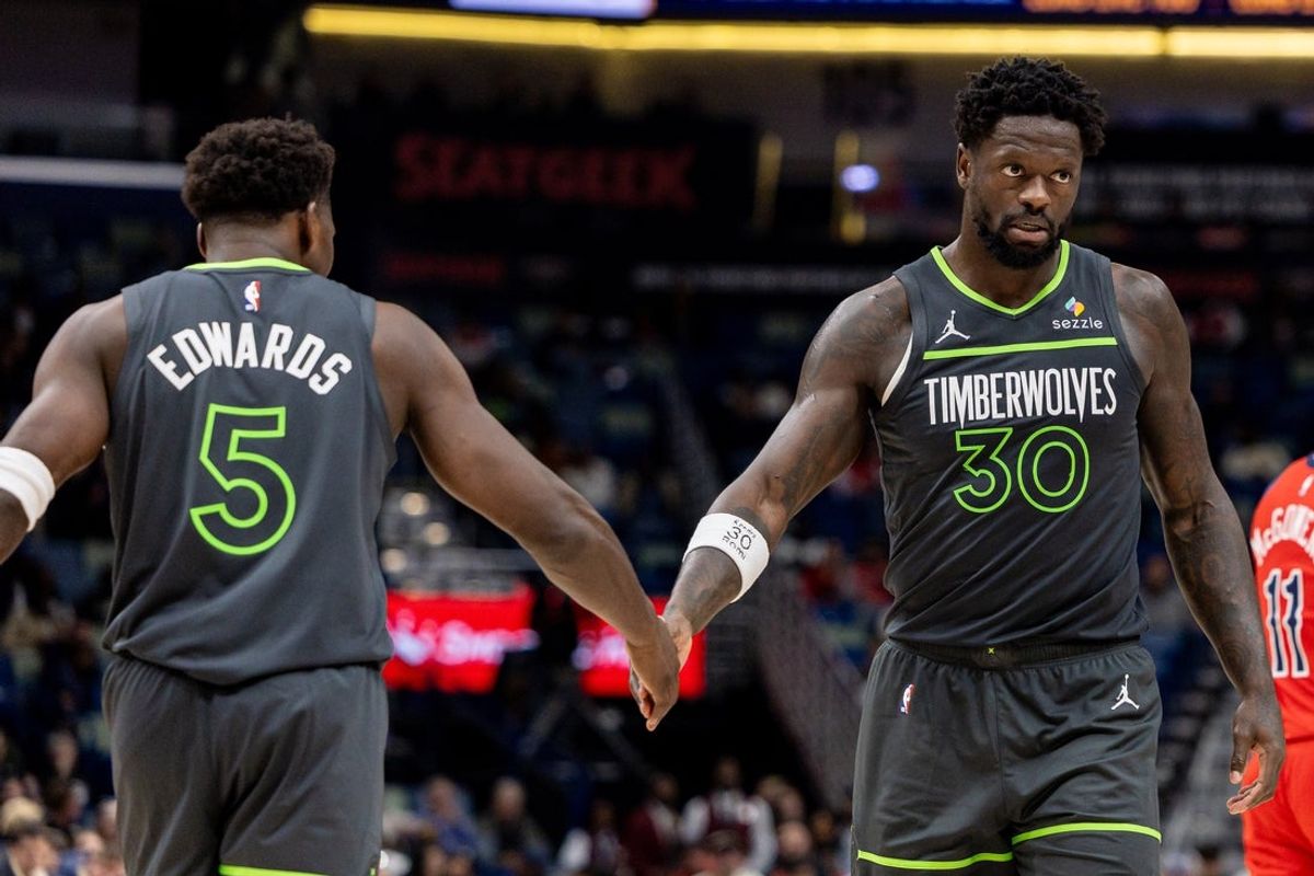 Dec 4, 2025; New Orleans, Louisiana, USA; Minnesota Timberwolves forward/center Julius Randle (30) claps hands with guard Anthony Edwards (5) after a play against the New Orleans Pelicans during the second half at Smoothie King Center. Mandatory Credit: Stephen Lew-Imagn Images