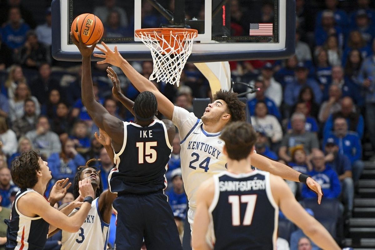 Dec 5, 2025; Nashville, TN, USA;  Gonzaga Bulldogs forward Graham Ike (15) shoots over  Kentucky Wildcats center Malachi Moreno (24) during the first half at Bridgestone Arena. Mandatory Credit: Steve Roberts-Imagn Images