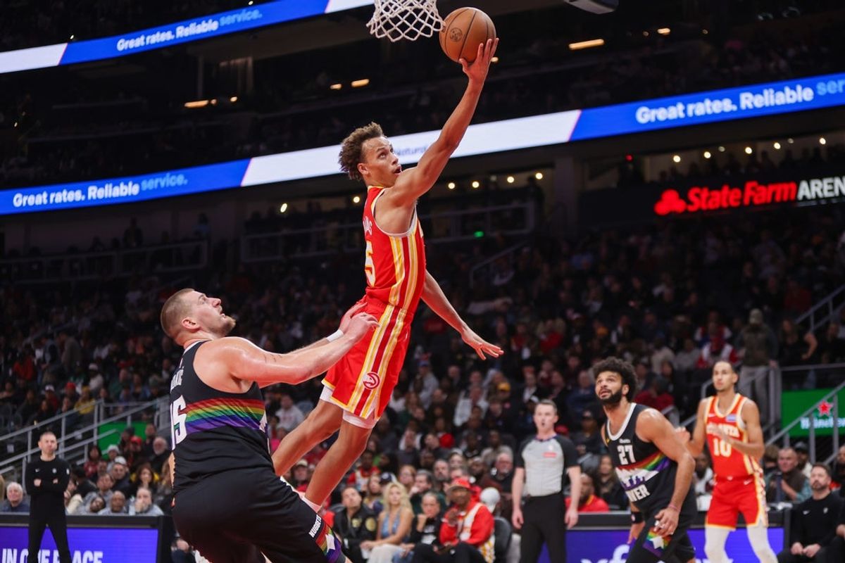 Dec 5, 2025; Atlanta, Georgia, USA; Atlanta Hawks guard Dyson Daniels (5) shoots against the Denver Nuggets in the second quarter at State Farm Arena. Mandatory Credit: Brett Davis-Imagn Images