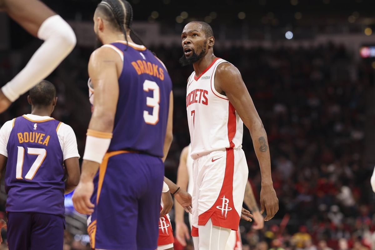 Dec 5, 2025; Houston, Texas, USA; Houston Rockets forward Kevin Durant (7) reacts after a play during the second quarter against the Phoenix Suns at Toyota Center. Mandatory Credit: Troy Taormina-Imagn Images