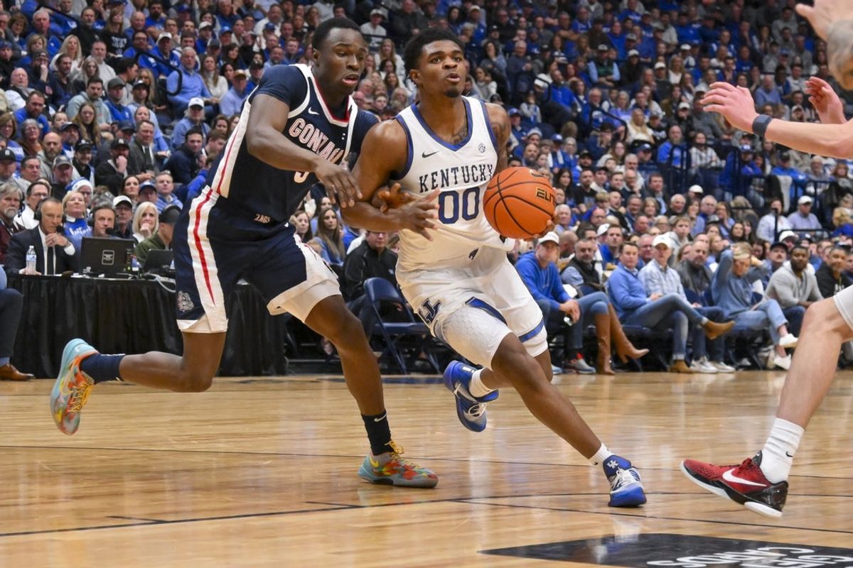 Dec 5, 2025; Nashville, TN, USA;  Kentucky Wildcats guard Otega Oweh (00) drives to the basket against the Gonzaga Bulldogs during the first half at Bridgestone Arena. Mandatory Credit: Steve Roberts-Imagn Images