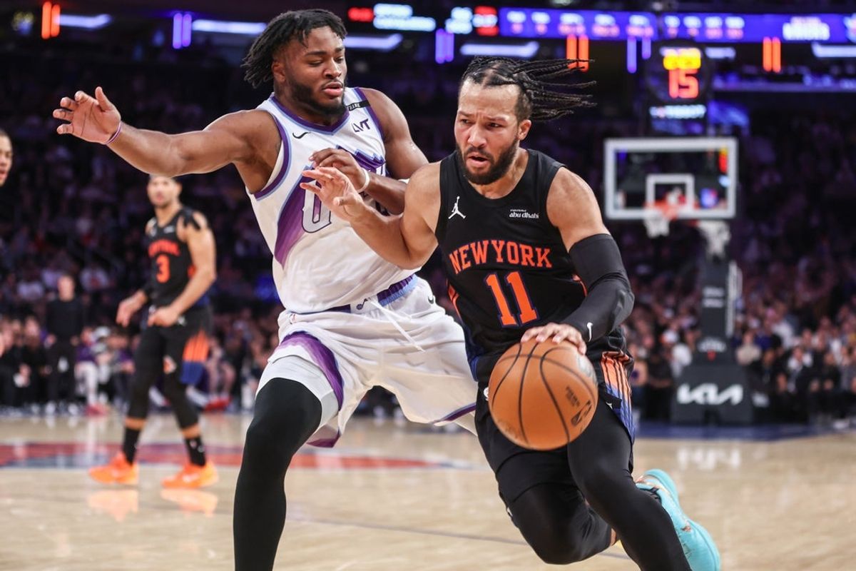 Dec 5, 2025; New York, New York, USA;  New York Knicks guard Jalen Brunson (11) looks to drive past Utah Jazz guard Isaiah Collier (8) in the third quarter at Madison Square Garden. Mandatory Credit: Wendell Cruz-Imagn Images