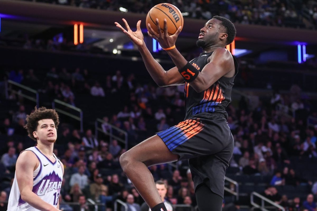 Dec 5, 2025; New York, New York, USA;  New York Knicks forward Mohamed Diawara (51) drives to the basket in the fourth quarter against the Utah Jazz at Madison Square Garden. Mandatory Credit: Wendell Cruz-Imagn Images