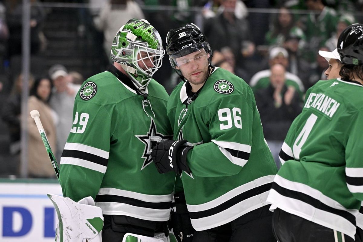 Dec 5, 2025; Dallas, Texas, USA; Dallas Stars goaltender Jake Oettinger (29) and right wing Mikko Rantanen (96) celebrate the Stars win over the San Jose Sharks at the American Airlines Center. Mandatory Credit: Jerome Miron-Imagn Images