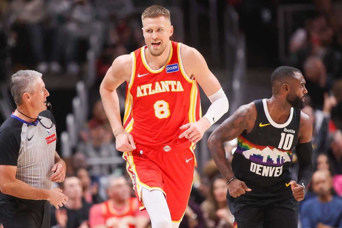 Dec 5, 2025; Atlanta, Georgia, USA; Atlanta Hawks center Kristaps Porzingis (8) reacts after a basket against the Denver Nuggets in the third quarter at State Farm Arena. Mandatory Credit: Brett Davis-Imagn Images