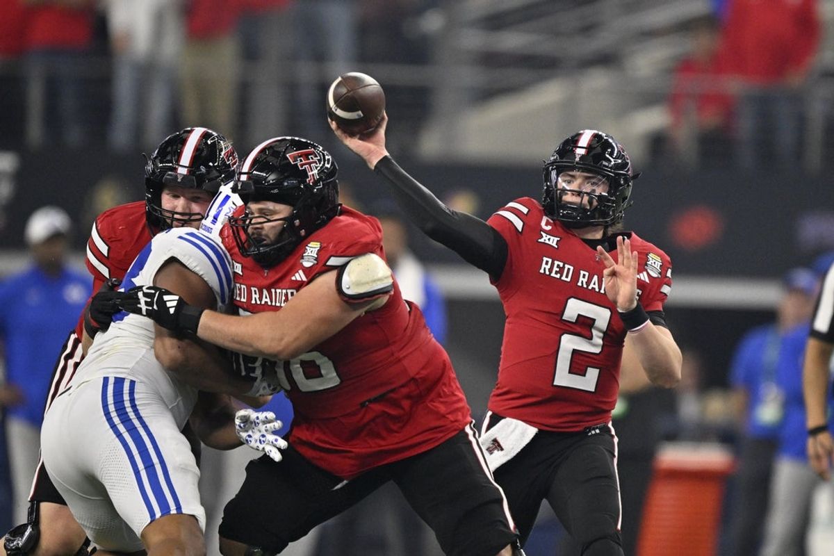 Dec 6, 2025; Arlington, TX, USA; Texas Tech Red Raiders quarterback Behren Morton (2) throws the ball during the first half against the BYU Cougars at AT&T Stadium. Mandatory Credit: Jerome Miron-Imagn Images