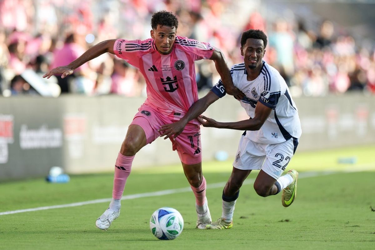 Dec 6, 2025; Fort Lauderdale, Florida, USA; Inter Miami defender Ian Fray (17) battles Vancouver Whitecaps FC midfielder Ali Ahmed (22) for the ball in the second half during the 2025 MLS Cup at Chase Stadium. Mandatory Credit: Nathan Ray Seebeck-Imagn Images