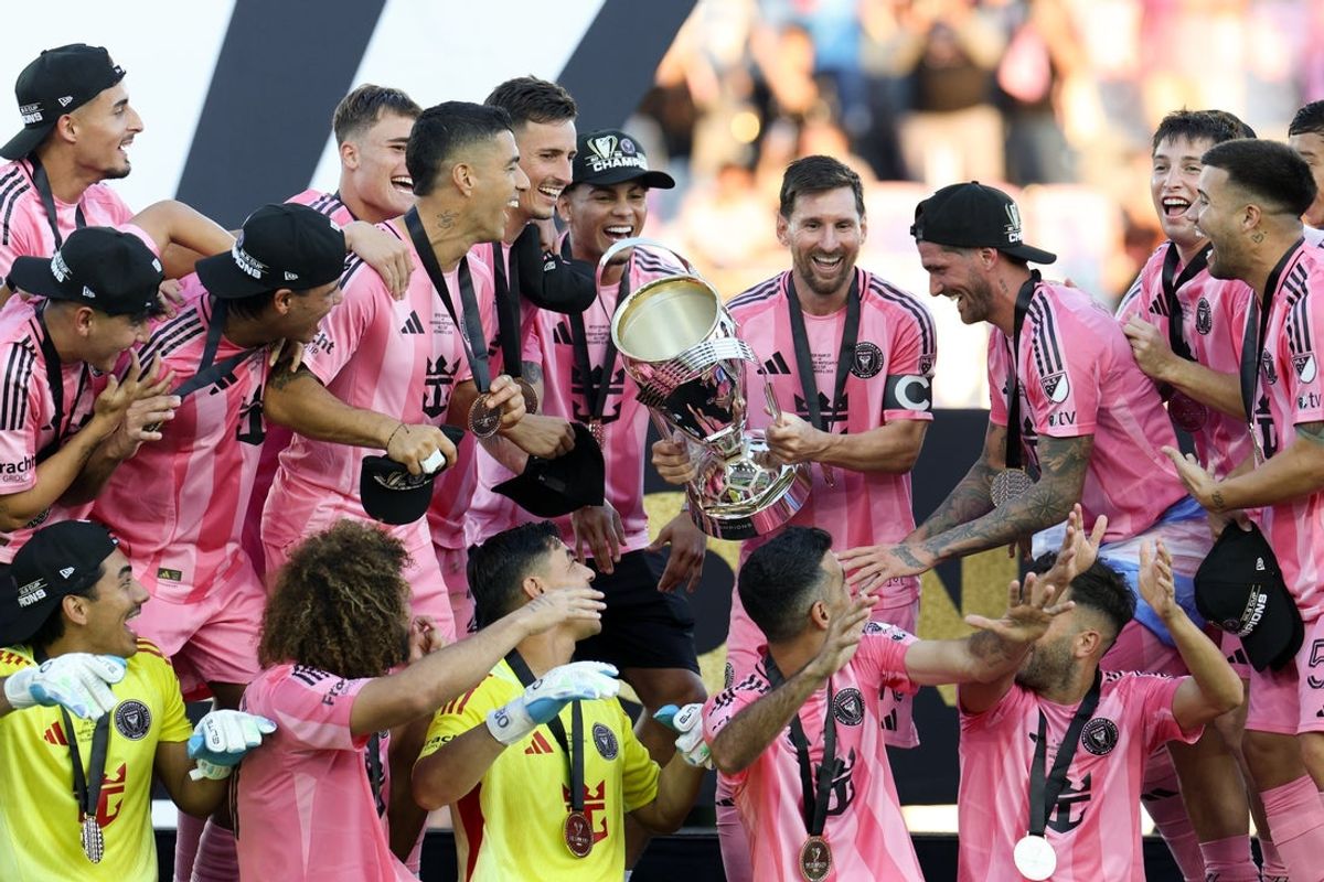 Dec 6, 2025; Fort Lauderdale, Florida, USA; Inter Miami forward Lionel Messi (10) lifts the Philip F. Anschutz trophy after winning the 2025 MLS Cup against the Vancouver Whitecaps FC at Chase Stadium. Mandatory Credit: Nathan Ray Seebeck-Imagn Images
