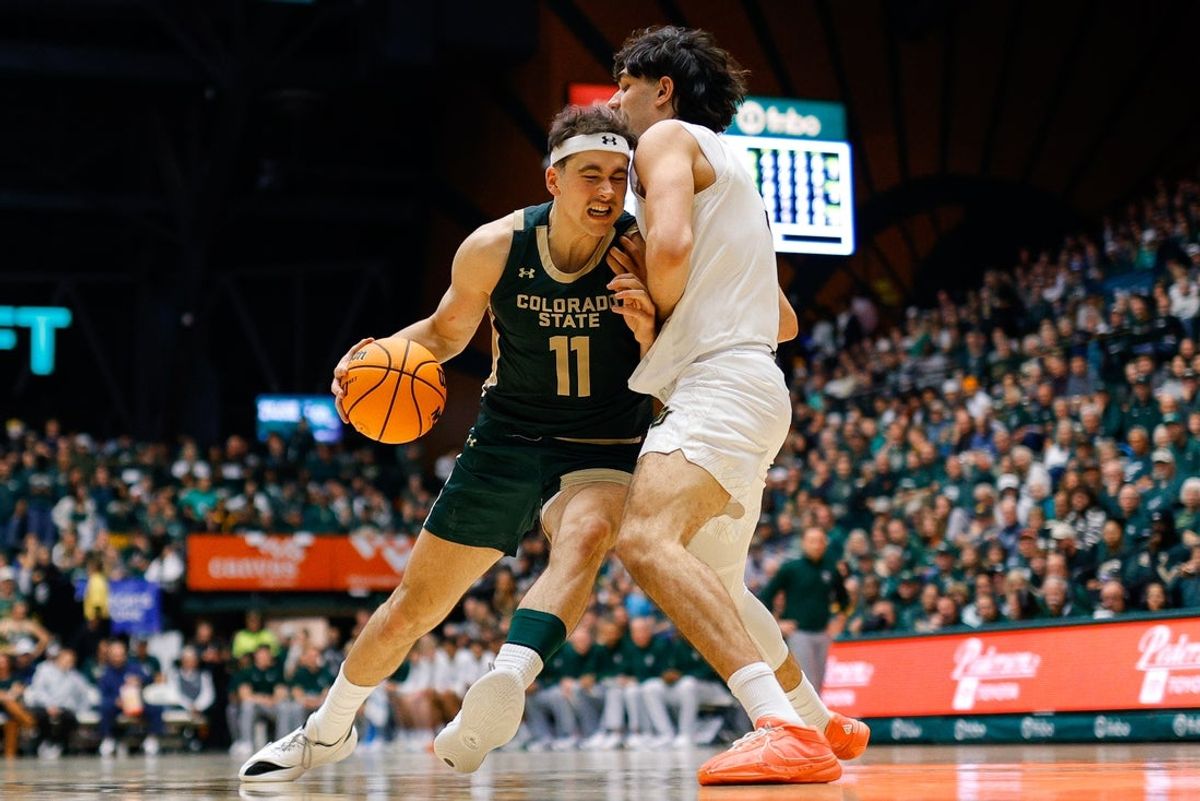 Dec 6, 2025; Fort Collins, Colorado, USA; Colorado State Rams forward Augustinas Kiudulas (11) drives to the basket against Colorado Buffaloes forward Alon Michaeli (3) in the first half at Moby Arena. Mandatory Credit: Isaiah J. Downing-Imagn Images
