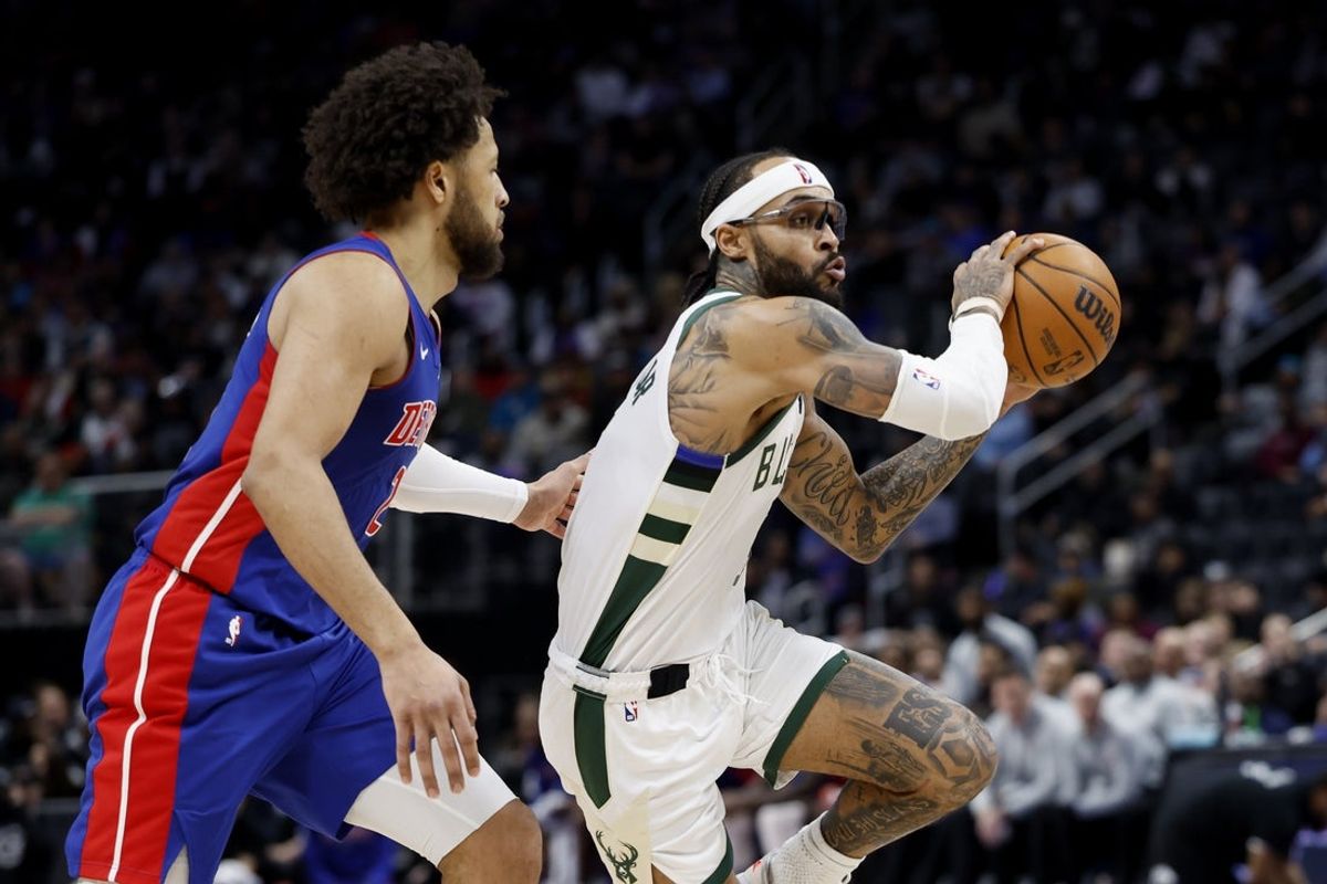 Dec 6, 2025; Detroit, Michigan, USA;  Milwaukee Bucks guard Gary Trent Jr. (5) dribbles defended by Detroit Pistons guard Cade Cunningham (2) in the first half at Little Caesars Arena. Mandatory Credit: Rick Osentoski-Imagn Images
