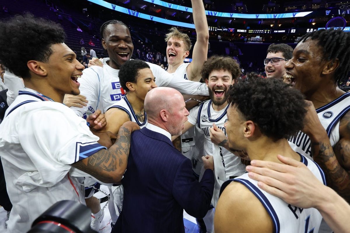 Dec 6, 2025; Philadelphia, PA, USA; Villanova Wildcats head coach Kevin Willard celebrates with this team after winning the Big 5 Classic Championship against the Penn Quakers at Xfinity Mobile Arena. Mandatory Credit: Bill Streicher-Imagn Images