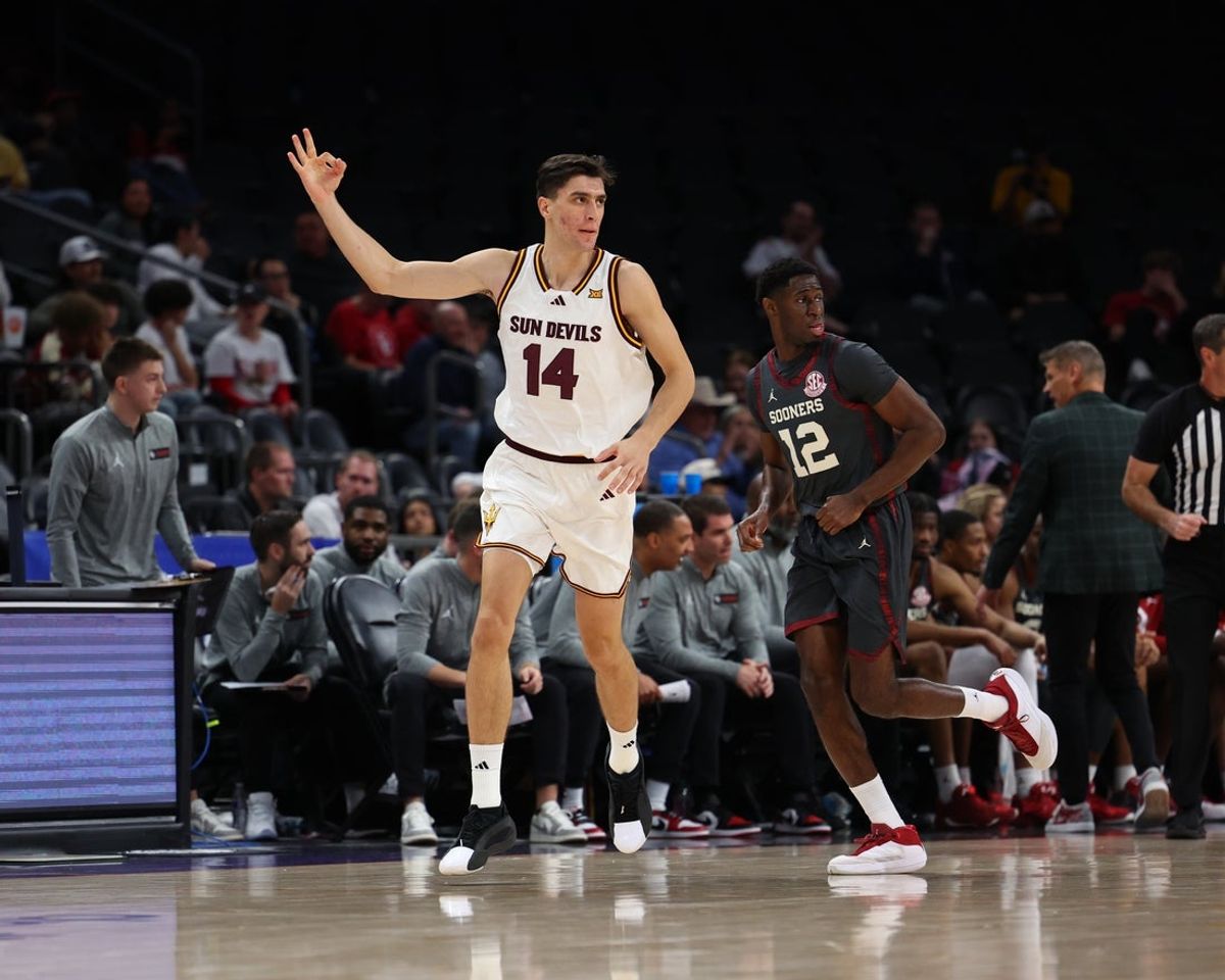 Dec 6, 2025; Phoenix, Arizona, USA; Arizona State Sun Devils forward Andrija Grbovic (14) celebrates a three point basket against the Oklahoma Sooners in the first half at PHX Arena. Mandatory Credit: Anna Carrington-Imagn Images