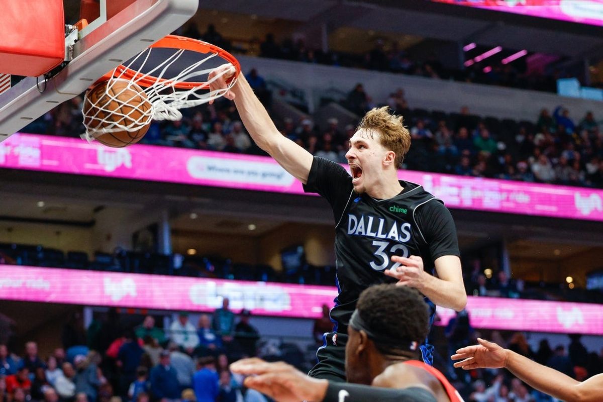 Dec 6, 2025; Dallas, Texas, USA; Dallas Mavericks forward Cooper Flagg (32) dunks during the fourth quarter against the Houston Rockets at American Airlines Center. Mandatory Credit: Andrew Dieb-Imagn Images