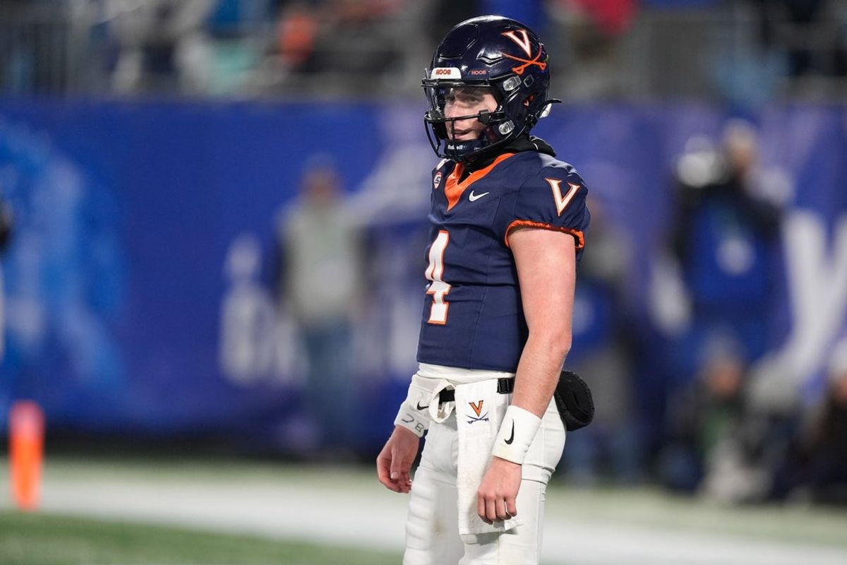Dec 6, 2025; Charlotte, NC, USA; Virginia Cavaliers quarterback Chandler Morris (4) looks on during the second half against the Duke Blue Devils during the 2025 ACC Championship game at Bank of America Stadium. Mandatory Credit: Jim Dedmon-Imagn Images