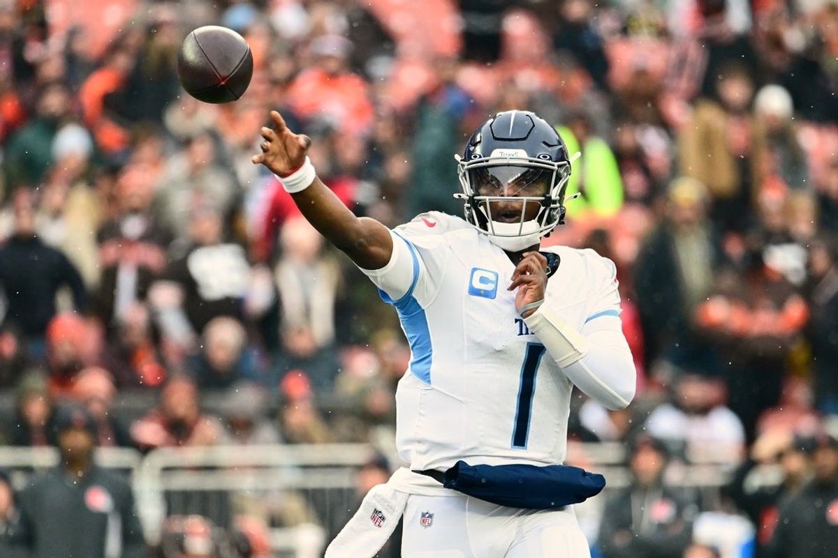 Dec 7, 2025; Cleveland, Ohio, USA; Tennessee Titans quarterback Cam Ward (1) throws a pass against the Cleveland Browns during the first quarter at Huntington Bank Field. Mandatory Credit: Ken Blaze-Imagn Images