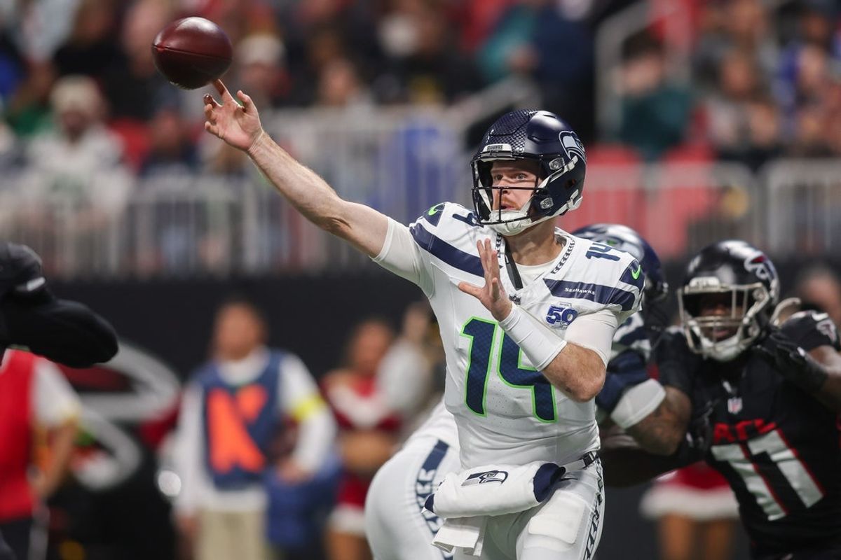 Dec 7, 2025; Atlanta, Georgia, USA; Seattle Seahawks quarterback Sam Darnold (14) throws a pass against the Atlanta Falcons in the first quarter at Mercedes-Benz Stadium. Mandatory Credit: Brett Davis-Imagn Images