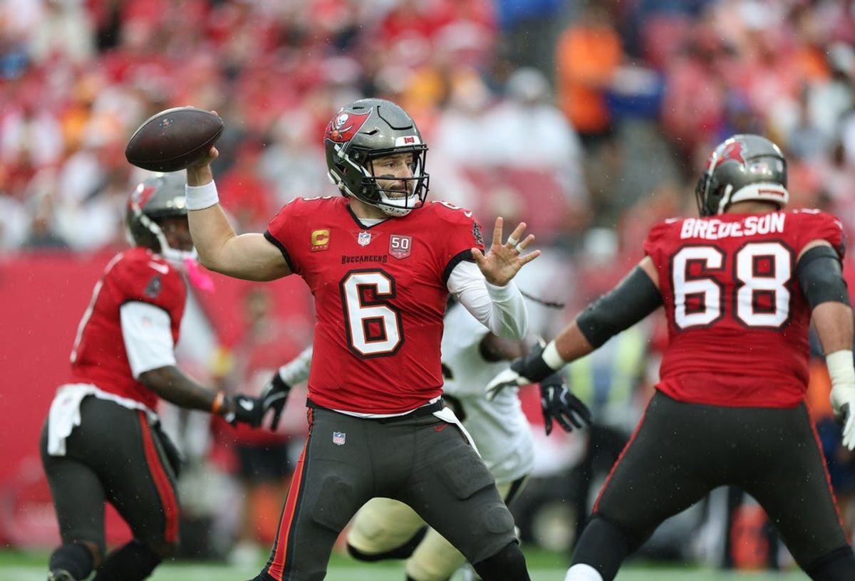 Dec 7, 2025; Tampa, Florida, USA; Tampa Bay Buccaneers quarterback Baker Mayfield (6) looks to throw downfield during the first quarter against the New Orleans Saints at Raymond James Stadium. Mandatory Credit: Nathan Ray Seebeck-Imagn Images