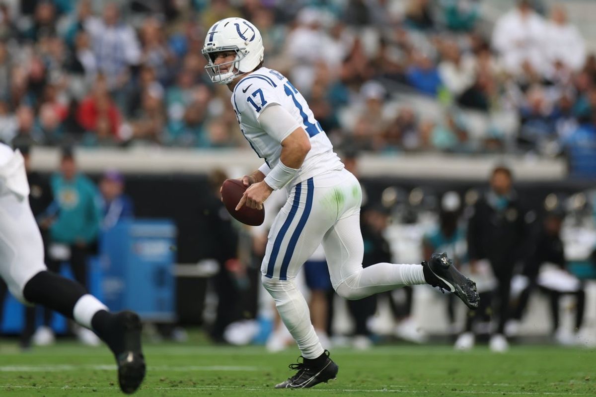 Dec 7, 2025; Jacksonville, Florida, USA;  Indianapolis Colts quarterback Daniel Jones (17)  rolls out against the Jacksonville Jaguars during the first half at EverBank Stadium. Mandatory Credit: Matt Pendleton-Imagn Images