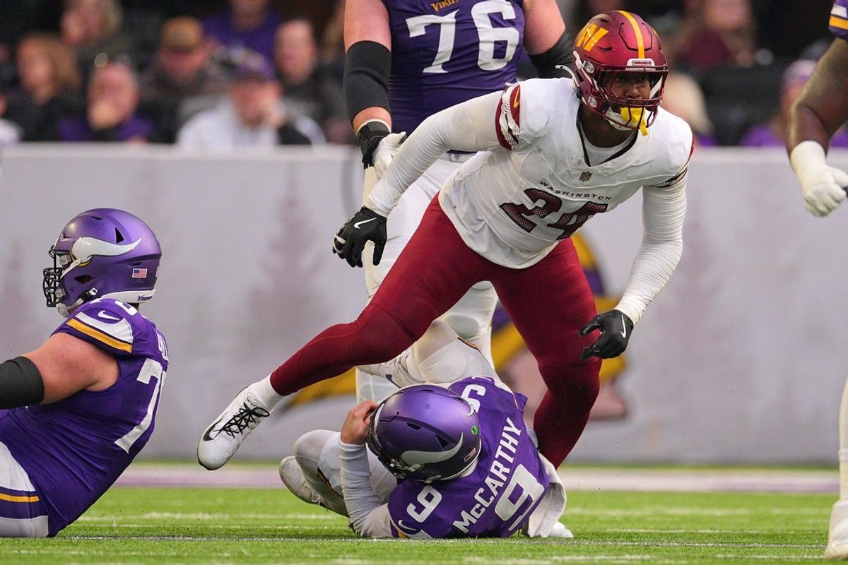 Dec 7, 2025; Minneapolis, Minnesota, USA; Washington Commanders outside linebacker Von Miller (24) sacks Minnesota Vikings quarterback J.J. McCarthy (9) during the first half at U.S. Bank Stadium. Mandatory Credit: Brad Rempel-Imagn Images