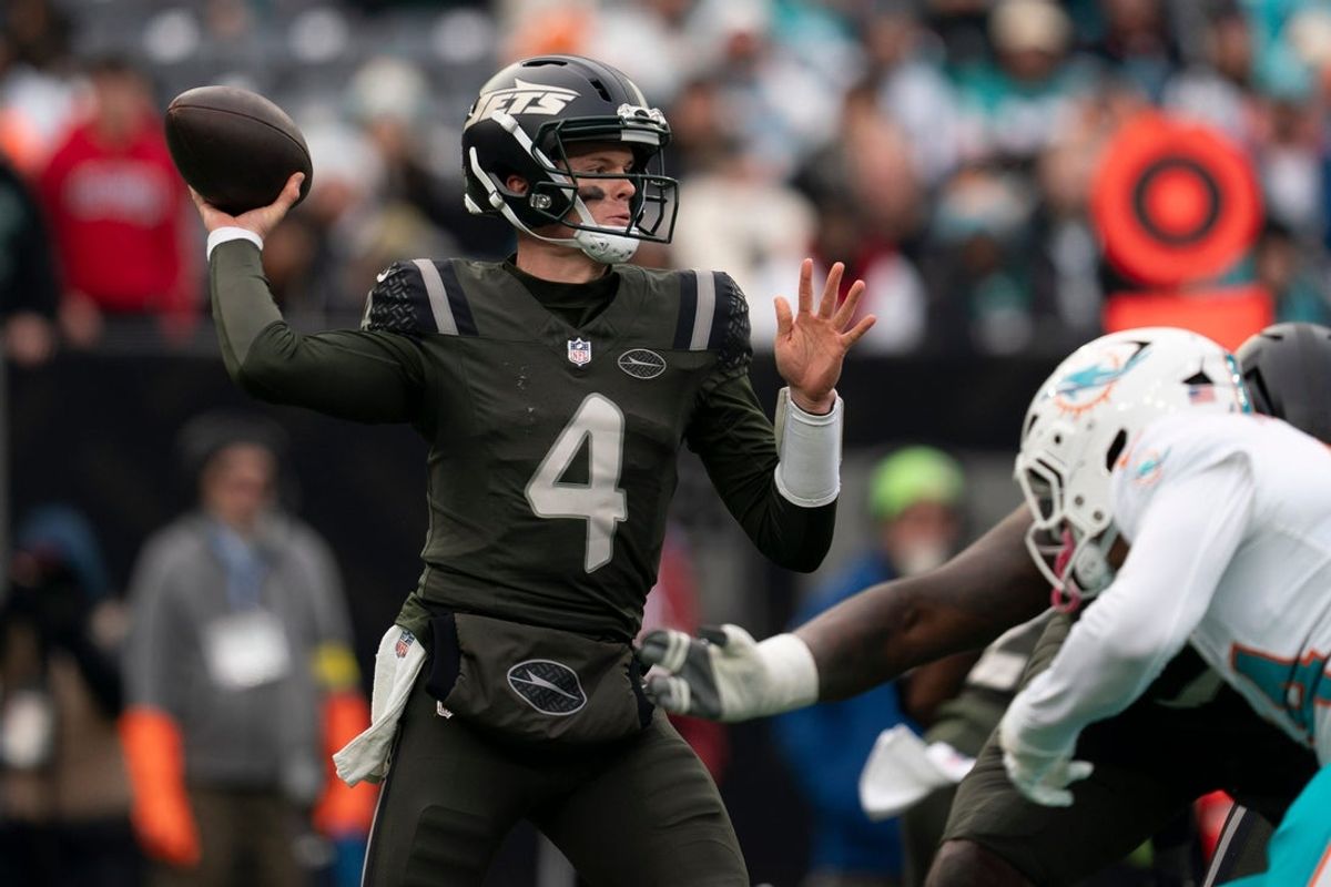 New York Jets quarterback Brady Cook (4) looks to pass the ball during a week 14 football game between the New York Jets and Miami Dolphins at MetLife Stadium on Sunday, Dec. 7, 2025.