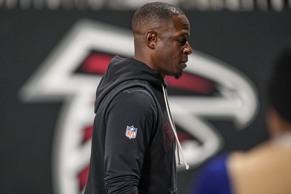 Dec 7, 2025; Atlanta, Georgia, USA; Atlanta Falcons head coach Raheem Morris leaves the field after the game against the Seattle Seahawks during the first half at Mercedes-Benz Stadium. Mandatory Credit: Dale Zanine-Imagn Images