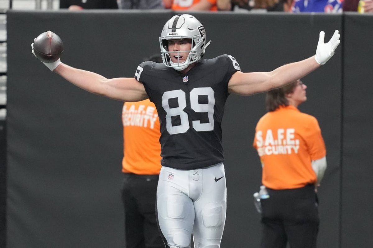 Dec 7, 2025; Paradise, Nevada, USA;  Las Vegas Raiders tight end Brock Bowers (89) reacts after catching a touchdown against the Denver Broncos during the first half at Allegiant Stadium. Mandatory Credit: Kirby Lee-Imagn Images
