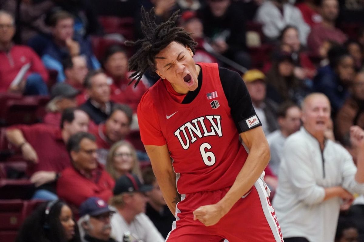 Dec 7, 2025; Stanford, California, USA;  UNLV Runnin' Rebels forward Tyrin Jones (6) celebrates a basket against the Stanford Cardinal in the first half at Maples Pavilion. Mandatory Credit: David Gonzales-Imagn Images