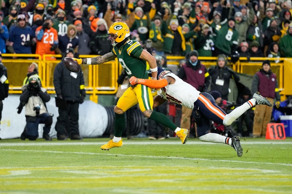 Dec 7, 2025; Green Bay, Wisconsin, USA; Green Bay Packers wide receiver Christian Watson (9) makes a catch for a touchdown in the second quarter against the Chicago Bears at Lambeau Field. Mandatory Credit: Jeff Hanisch-Imagn Images