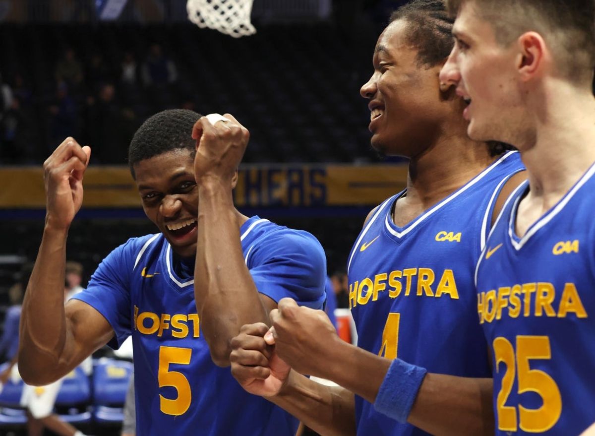 Dec 7, 2025; Pittsburgh, Pennsylvania, USA; Hofstra Pride guard Cruz Davis (5) and forward Joshua DeCady (4) and guard German Plotnikov (25) celebrate after defeating the Pittsburgh Panthers at the Petersen Events Center. Mandatory Credit: Charles LeClaire-Imagn Images