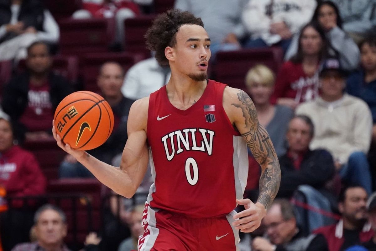 Dec 7, 2025; Stanford, California, USA;  UNLV Runnin' Rebels guard Dra Gibbs-Lawhorn (0) dribbles upcourt against the Stanford Cardinal in the second half at Maples Pavilion. Mandatory Credit: David Gonzales-Imagn Images
