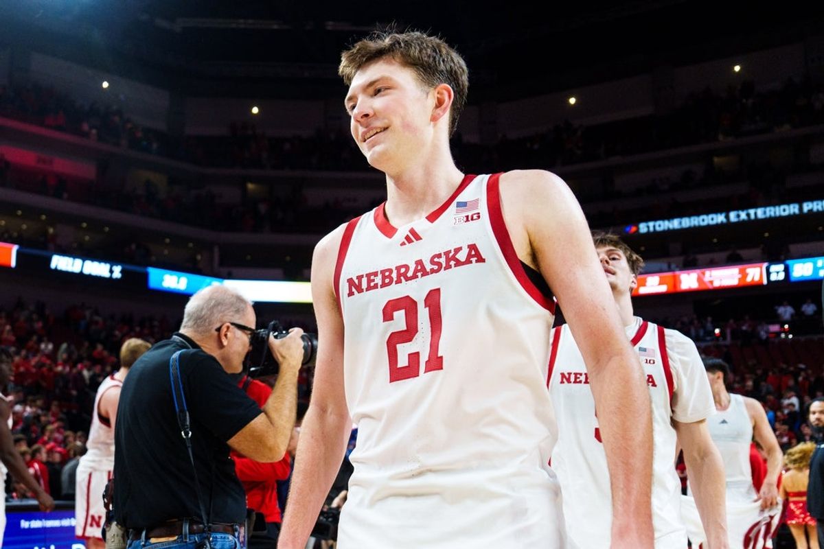 Dec 7, 2025; Lincoln, Nebraska, USA; Nebraska Cornhuskers forward Pryce Sandfort (21) reacts while walking off the court after defeating the Creighton Bluejays at Pinnacle Bank Arena. Mandatory Credit: Dylan Widger-Imagn Images