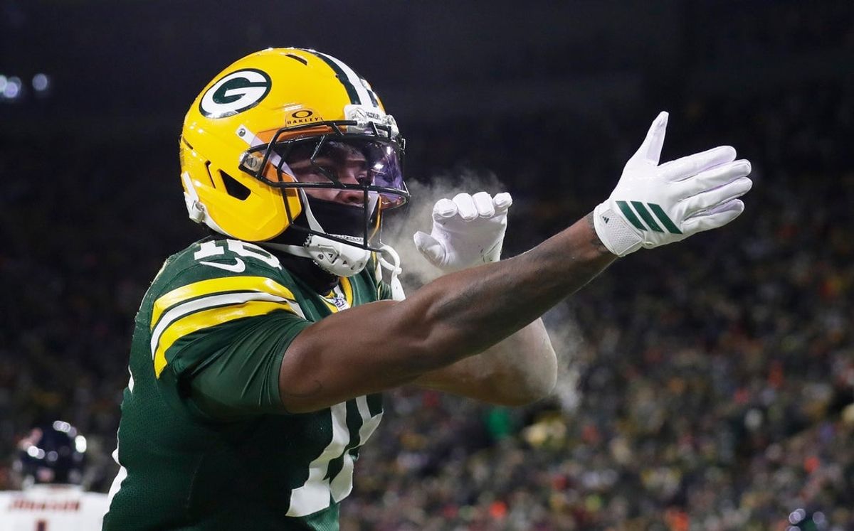 Green Bay Packers cornerback Bo Melton (16) celebrates a touchdown during a football game against the Chicago Bears on Dec. 7, 2025, at Lambeau Field in Green Bay, Wis. The Packers defeated the Bears 28-21.