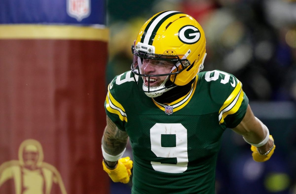 Green Bay Packers wide receiver Christian Watson (9) celebrates a touchdown during a football game against the Chicago Bears on Dec. 7, 2025, at Lambeau Field in Green Bay, Wis. The Packers defeated the Bears 28-21.
