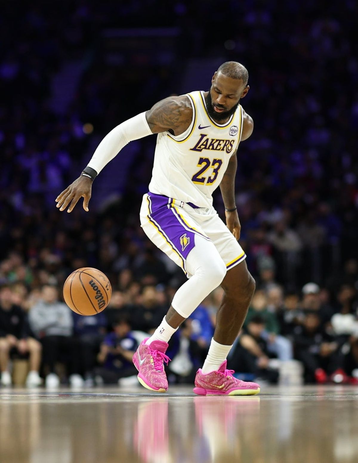 Dec 7, 2025; Philadelphia, Pennsylvania, USA; Los Angeles Lakers forward Lebron James (23) dribbles the ball against the Philadelphia 76ers during the second quarter at Xfinity Mobile Arena. Mandatory Credit: Bill Streicher-Imagn Images