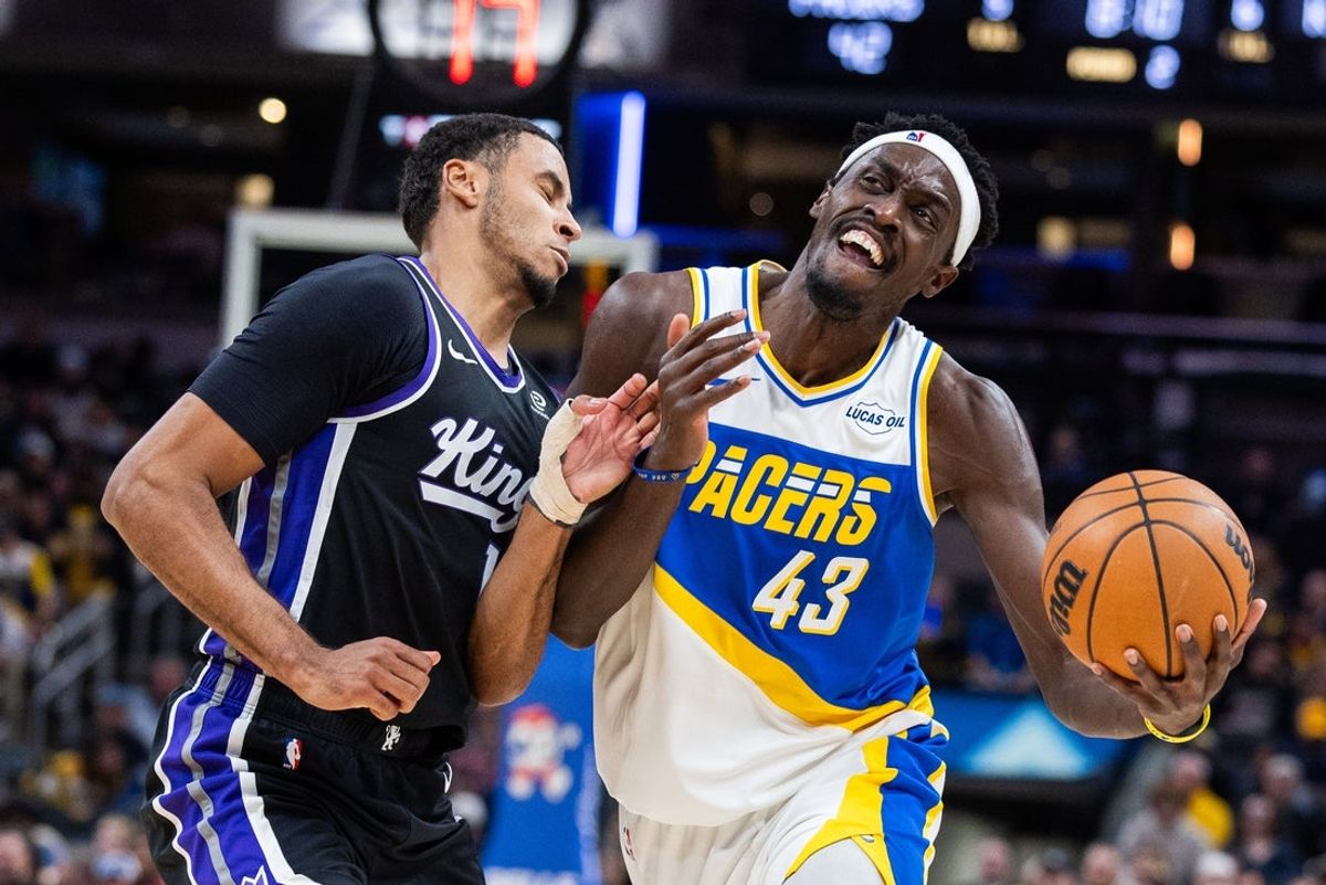 Dec 8, 2025; Indianapolis, Indiana, USA; Indiana Pacers forward Pascal Siakam (43) dribbles the ball while Sacramento Kings forward Keegan Murray (13) defends in the first half at Gainbridge Fieldhouse. Mandatory Credit: Trevor Ruszkowski-Imagn Images