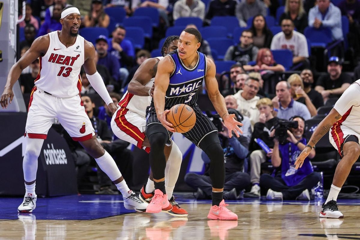 Dec 9, 2025; Orlando, Florida, USA; Orlando Magic guard Desmond Bane (3) drives to the basket during the first quarter against the Miami Heat at Kia Center. Mandatory Credit: Mike Watters-Imagn Images