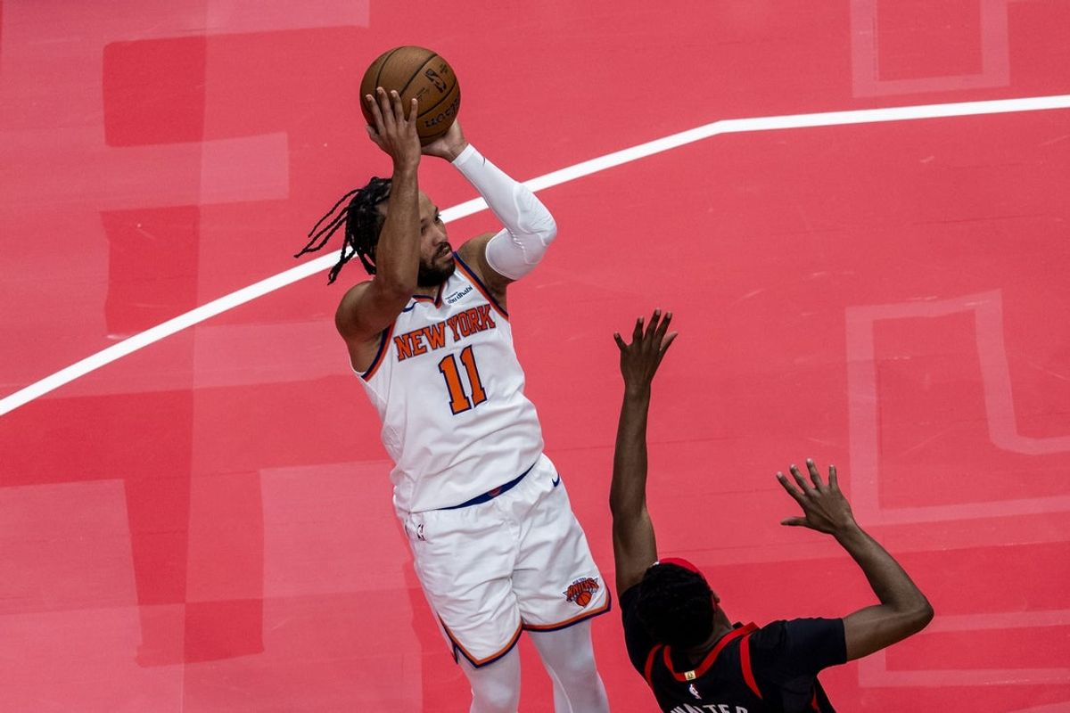 Dec 9, 2025; Toronto, Ontario, CAN;  JNew York Knicks guard Jalen Brunson (11) shoots against the Toronto Raptors during the first half at the 2025-26 NBA Emirates Cup at Scotiabank Arena. Mandatory Credit: Kevin Sousa-Imagn Images