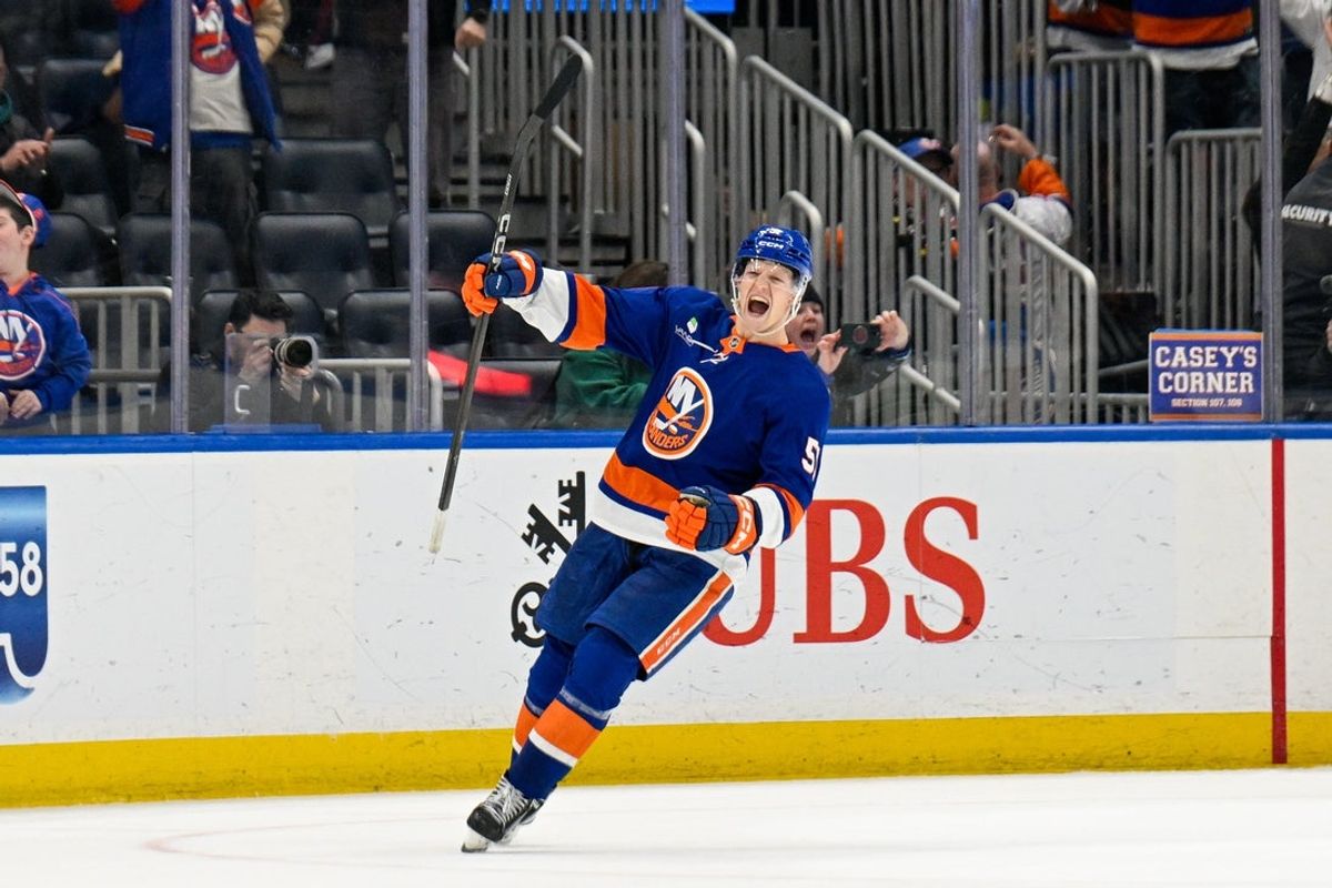 Dec 9, 2025; Elmont, New York, USA; New York Islanders left wing Emil Heineman (51) celebrates his winning goal after shootouts against the Vegas Golden Knights at UBS Arena. Mandatory Credit: Dennis Schneidler-Imagn Images