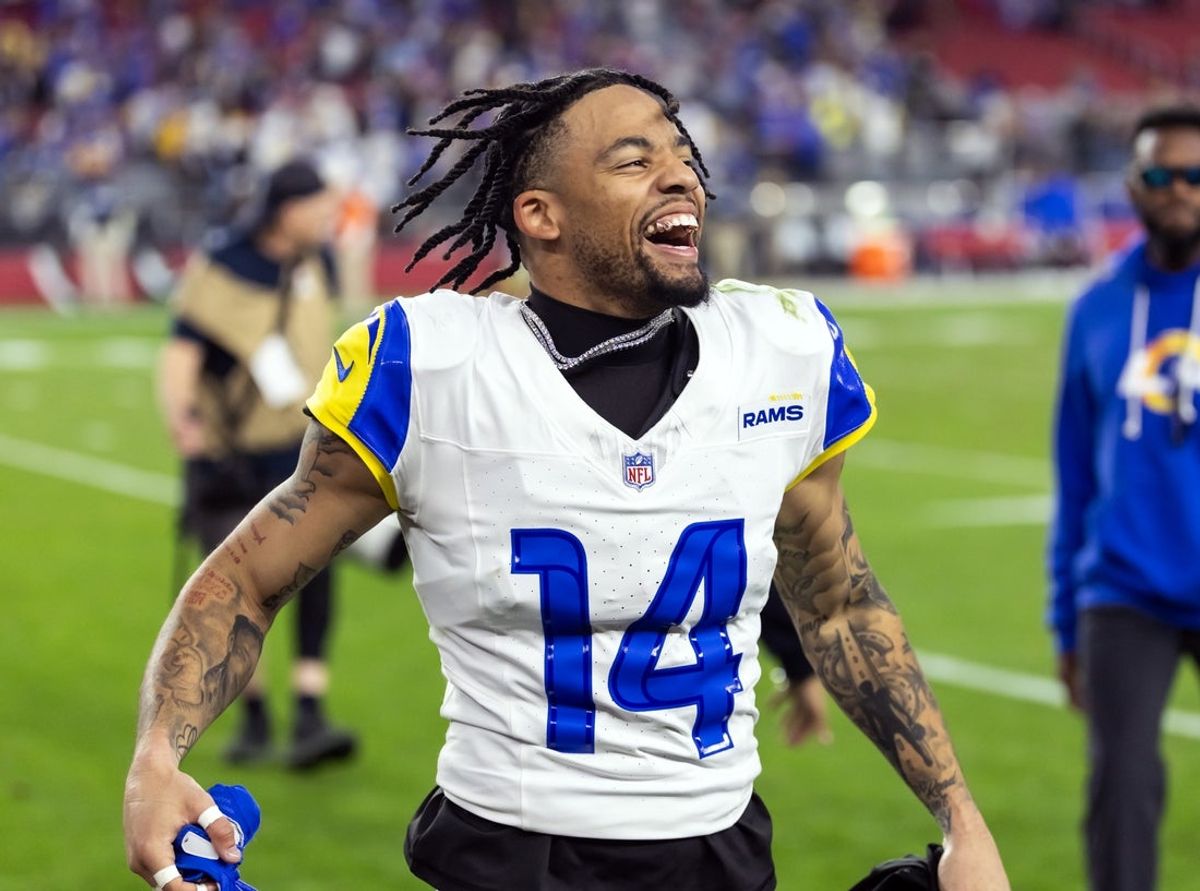 Dec 7, 2025; Glendale, Arizona, USA; Los Angeles Rams cornerback Cobie Durant (14) celebrates after defeating the Arizona Cardinals at State Farm Stadium. Mandatory Credit: Mark J. Rebilas-Imagn Images