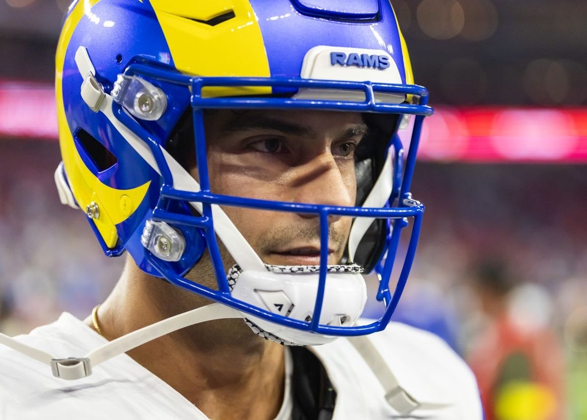 Dec 7, 2025; Glendale, Arizona, USA; Los Angeles Rams quarterback Jimmy Garoppolo (11) against the Arizona Cardinals at State Farm Stadium. Mandatory Credit: Mark J. Rebilas-Imagn Images