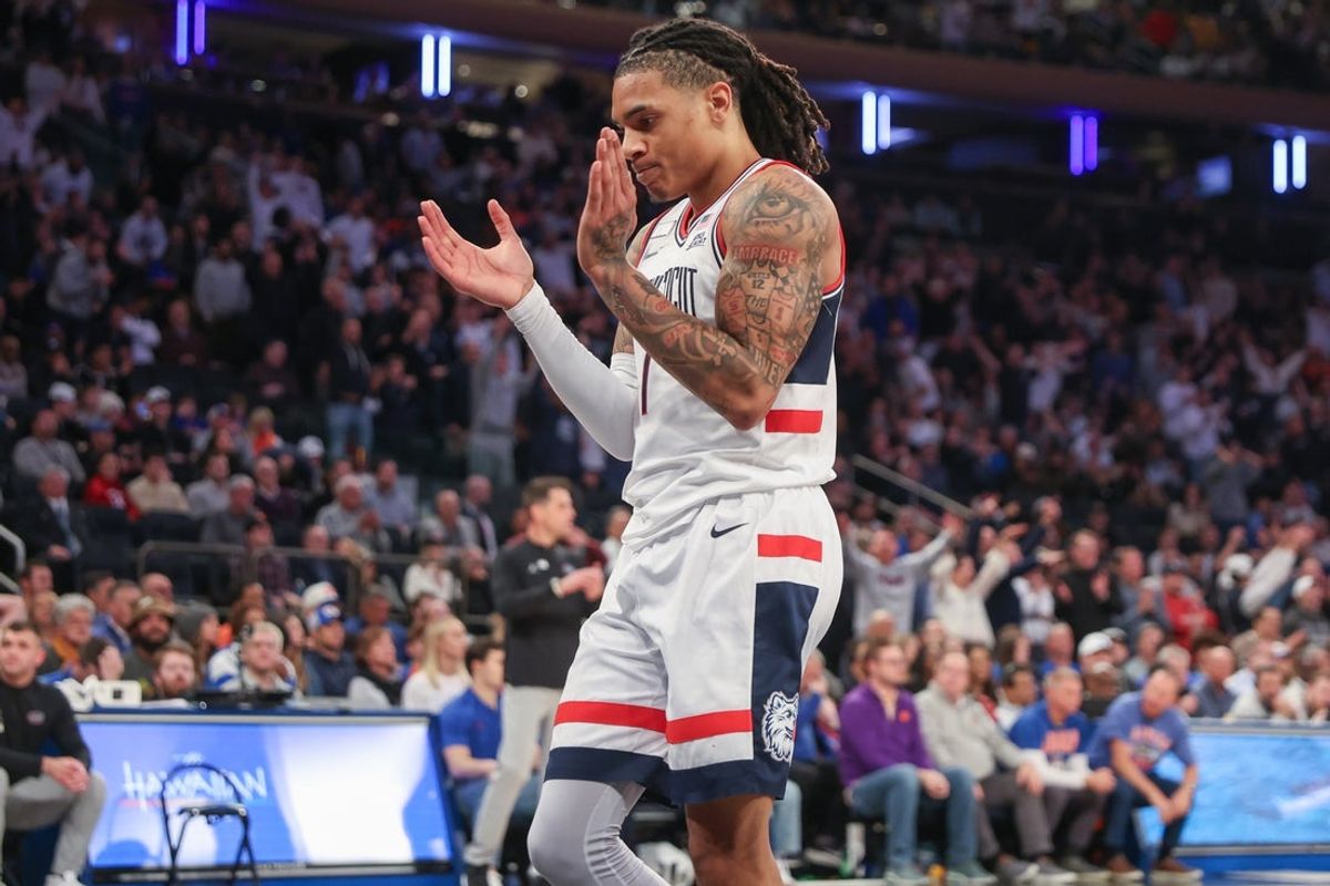 Dec 9, 2025; New York, New York, USA;  UConn Huskies guard Solo Ball (1) celebrates in the second half against the Florida Gators at Madison Square Garden. Mandatory Credit: Wendell Cruz-Imagn Images