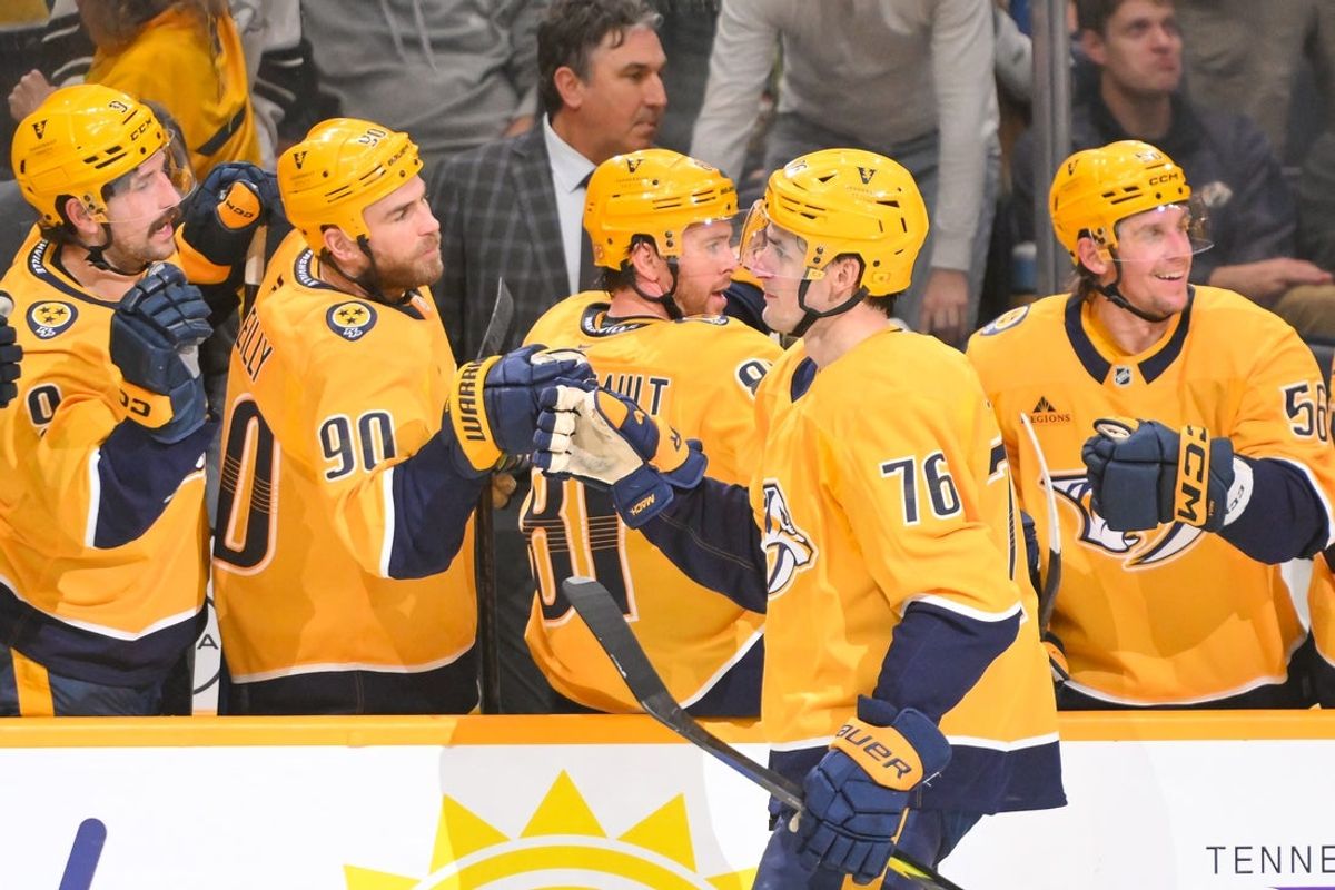 Dec 9, 2025; Nashville, Tennessee, USA;  Nashville Predators defenseman Brady Skjei (76) celebrates with his teammates after scoring a goal against the Colorado Avalanche  during the third period at Bridgestone Arena. Mandatory Credit: Steve Roberts-Imagn Images
