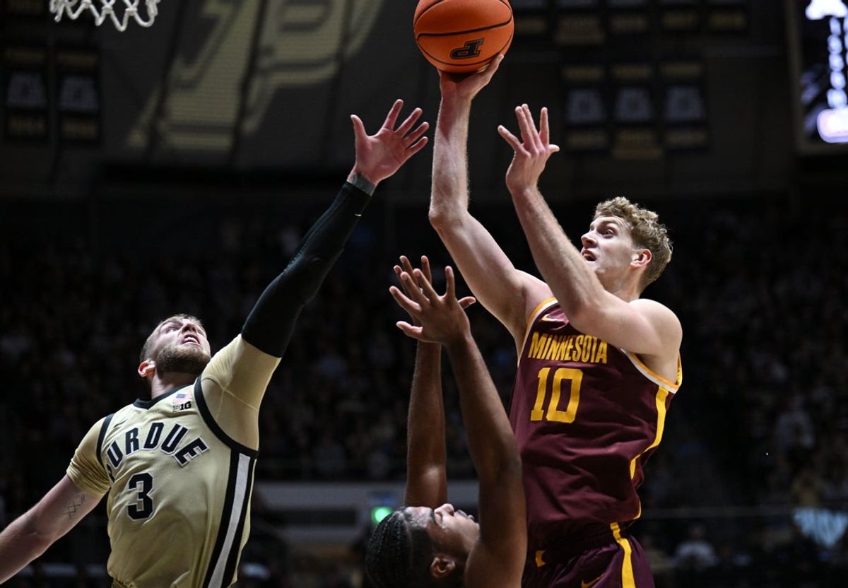 Dec 10, 2025; West Lafayette, Indiana, USA; Minnesota Golden Gophers forward Cade Tyson (10) shoots the ball over Purdue Boilermakers guard Braden Smith (3) during the first half at Mackey Arena. Mandatory Credit: Marc Lebryk-Imagn Images