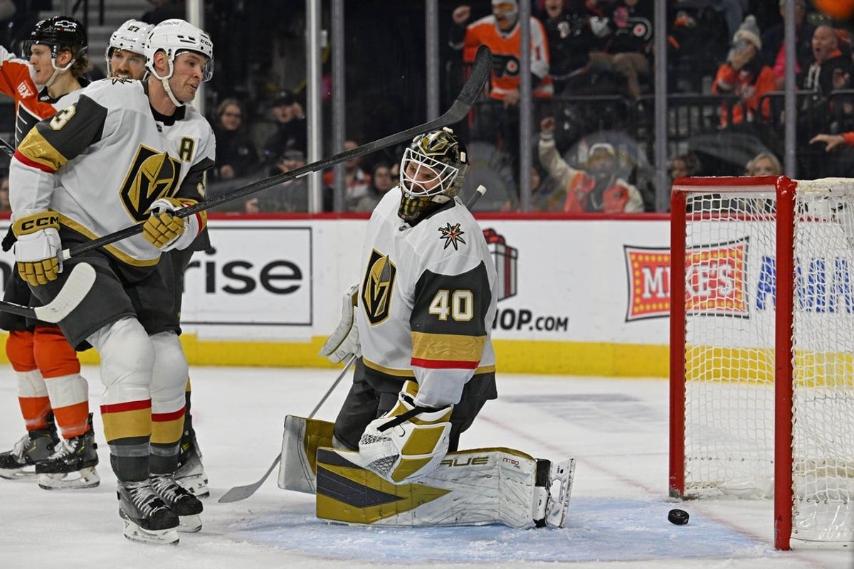 Dec 11, 2025; Philadelphia, Pennsylvania, USA; Vegas Golden Knights goaltender Akira Schmid (40) reacts after allowing a goal against the Philadelphia Flyers during the first period at Xfinity Mobile Arena. Mandatory Credit: Eric Hartline-Imagn Images