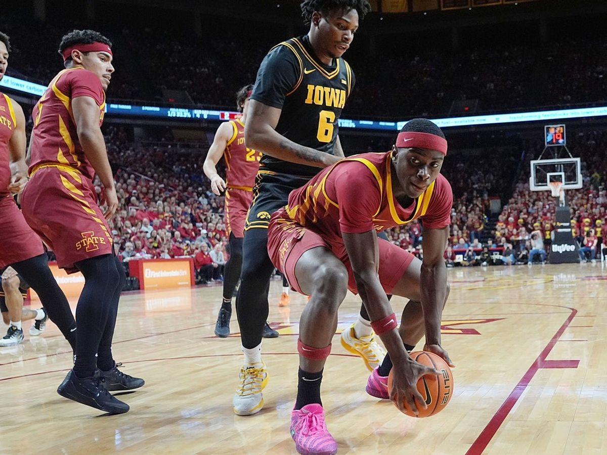 Iowa State Cyclones forward Killyan Toure (27) steals the ball from Iowa Hawkeyes guard/forward Tavion Banks (6) during the first half in the men’s basketball Cy-Hawk series on Dec. 11, 2025, in Ames, Iowa.