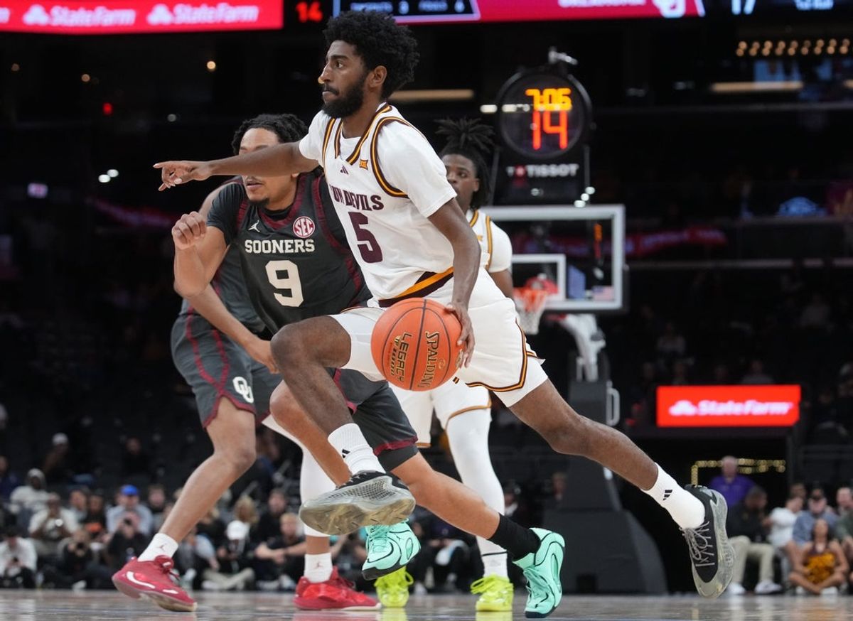 ASU Sun Devils guard Moe Odum (5) drives into the lane against the Oklahoma Sooners at Mortgage Matchup Center on Dec. 6, 2025, in Phoenix, Arizona.