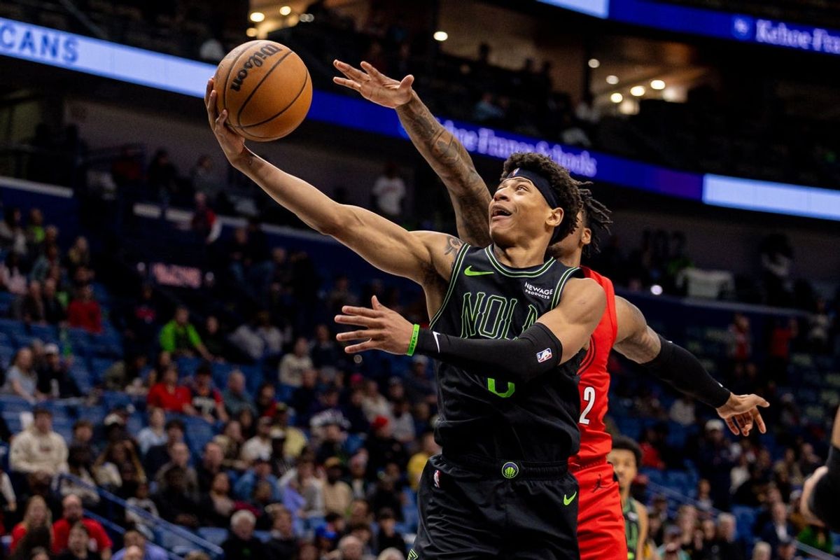 Dec 11, 2025; New Orleans, Louisiana, USA;  New Orleans Pelicans guard Jeremiah Fears (0) drives to the basket against the Portland Trail Blazers during the second half at Smoothie King Center. Mandatory Credit: Stephen Lew-Imagn Images