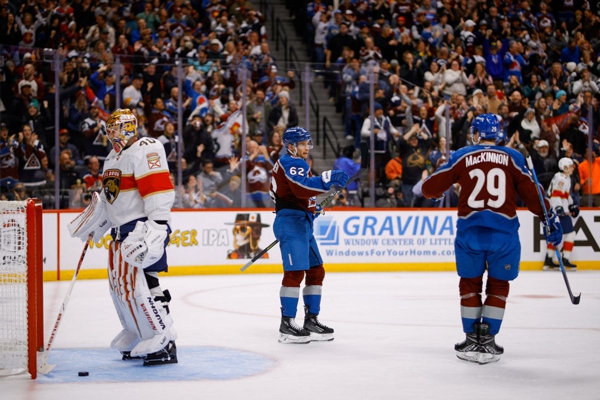 Dec 11, 2025; Denver, Colorado, USA; Colorado Avalanche left wing Artturi Lehkonen (62) celebrates his goal with center Nathan MacKinnon (29) against Florida Panthers goaltender Daniil Tarasov (40) in the second period at Ball Arena. Mandatory Credit: Isaiah J. Downing-Imagn Images